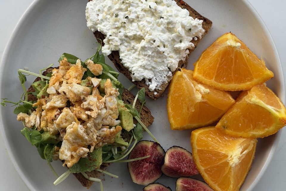 Cottage cheese toast, eggs on avocado toast, figs and orange
